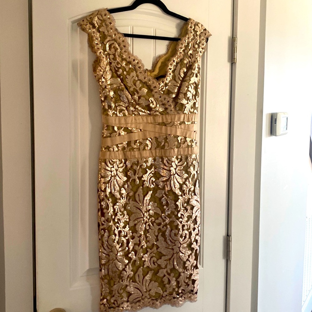 Formal dress. Great for weddings or graduations. Very flattering. True size 4